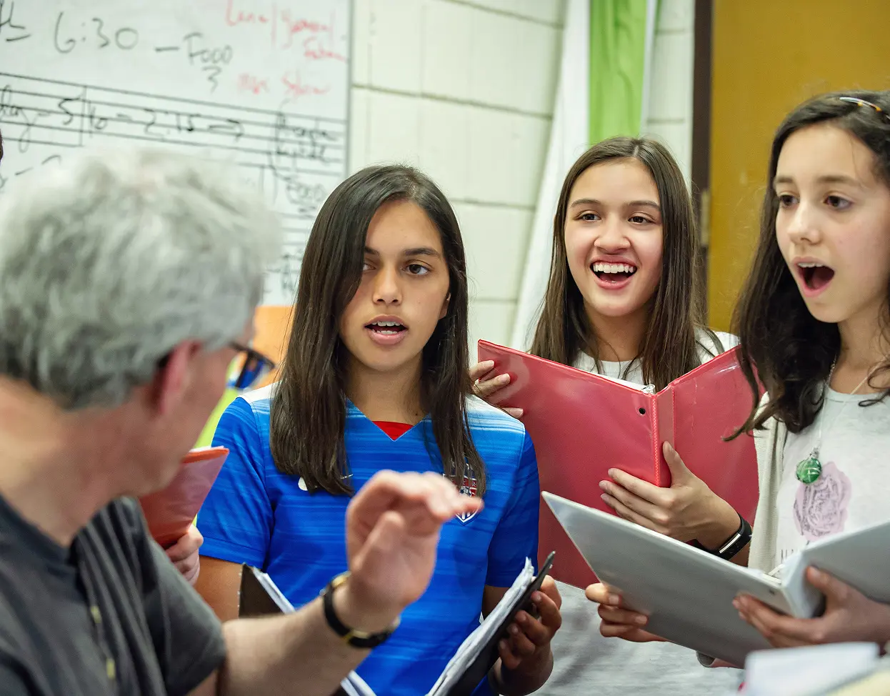 Teacher with students