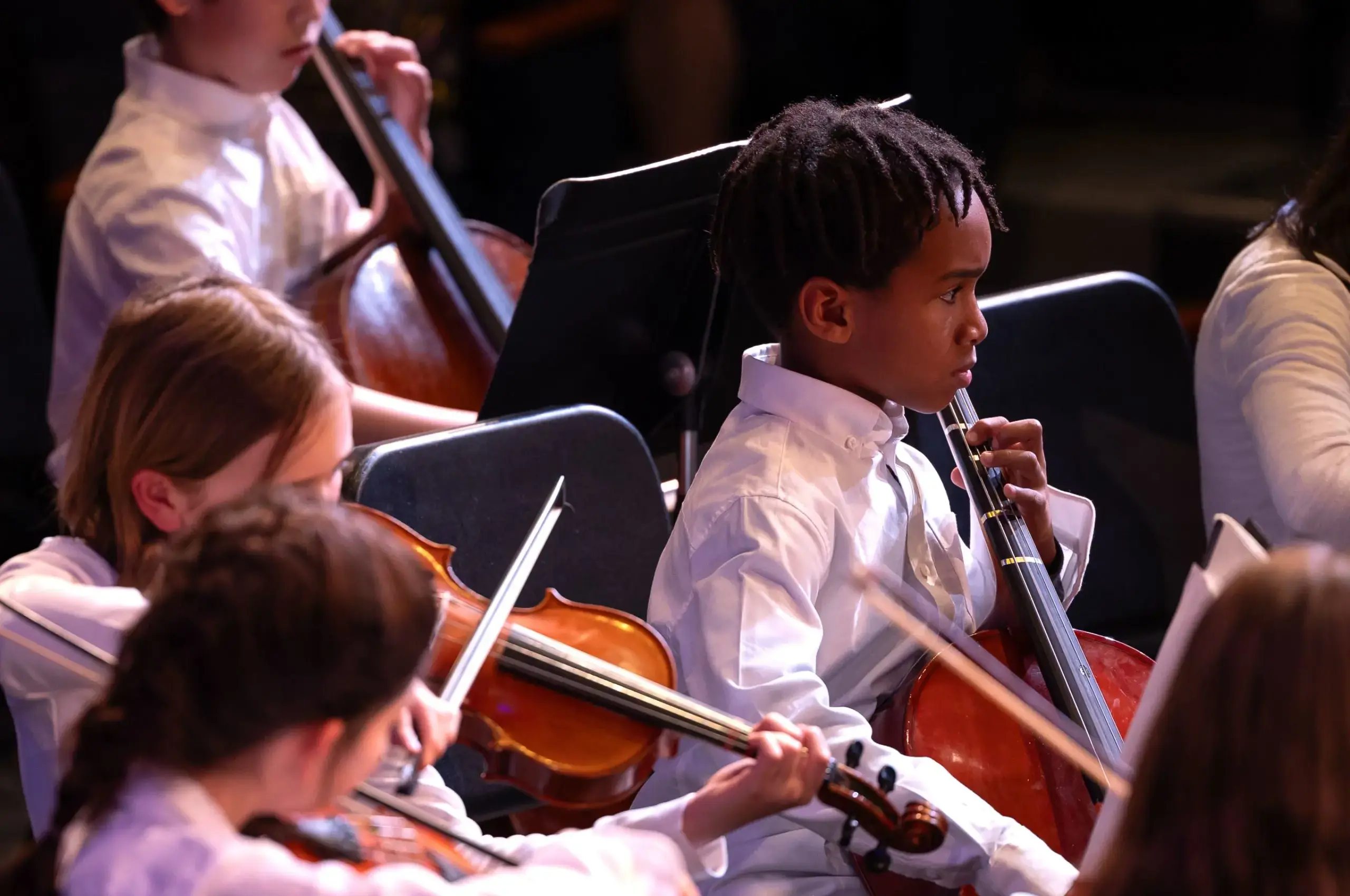 Students performing with instruments