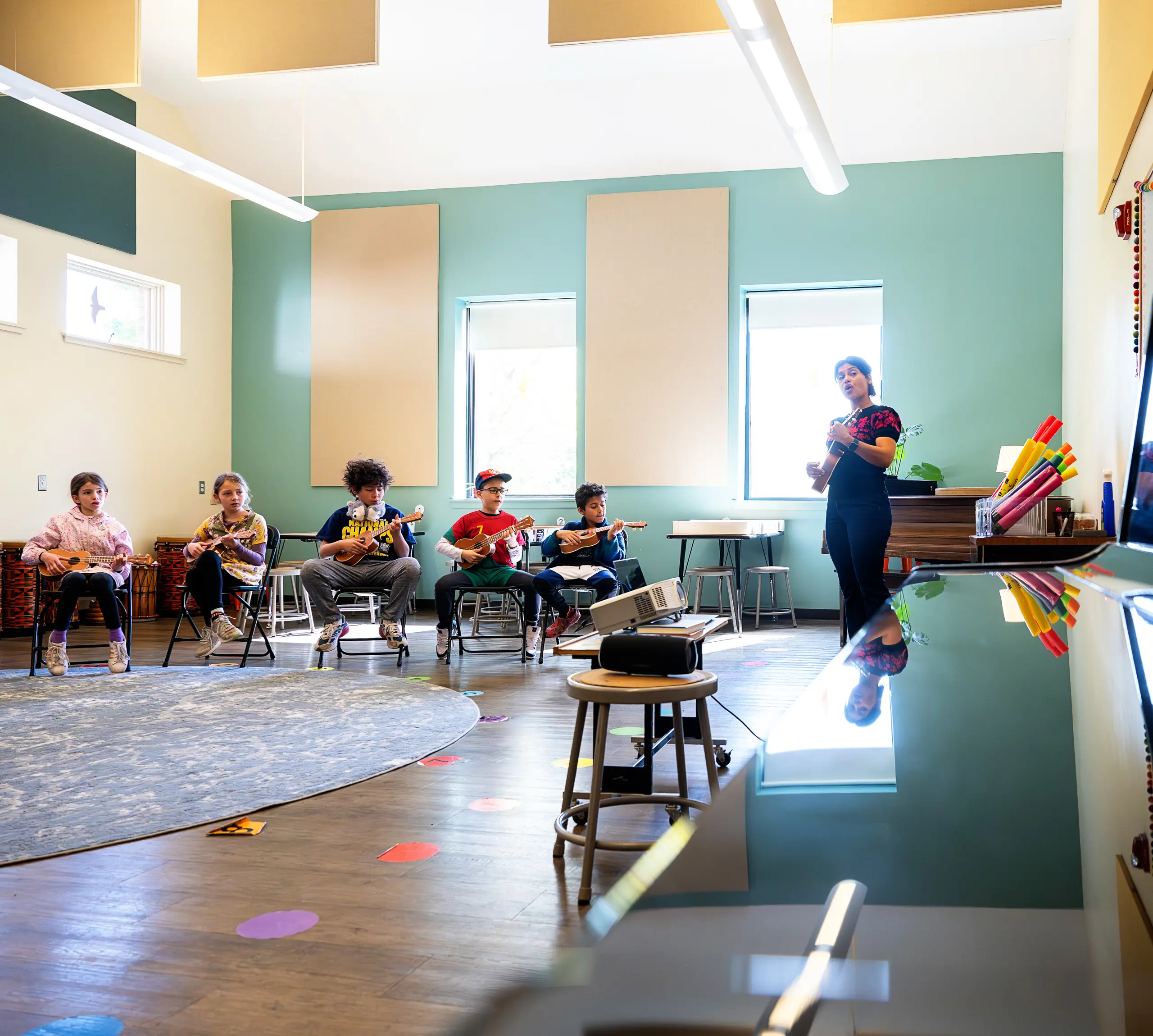 Students learning music together in the lower school