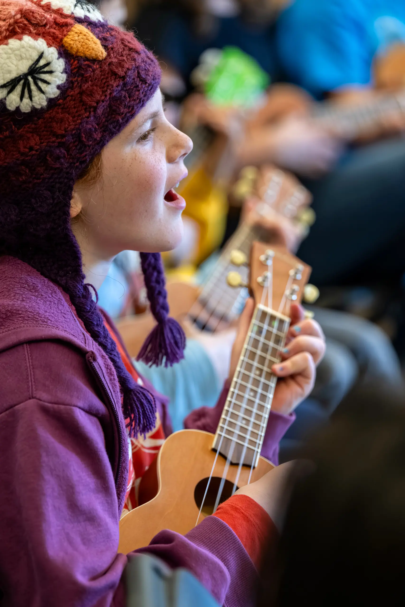 A student singing and playing