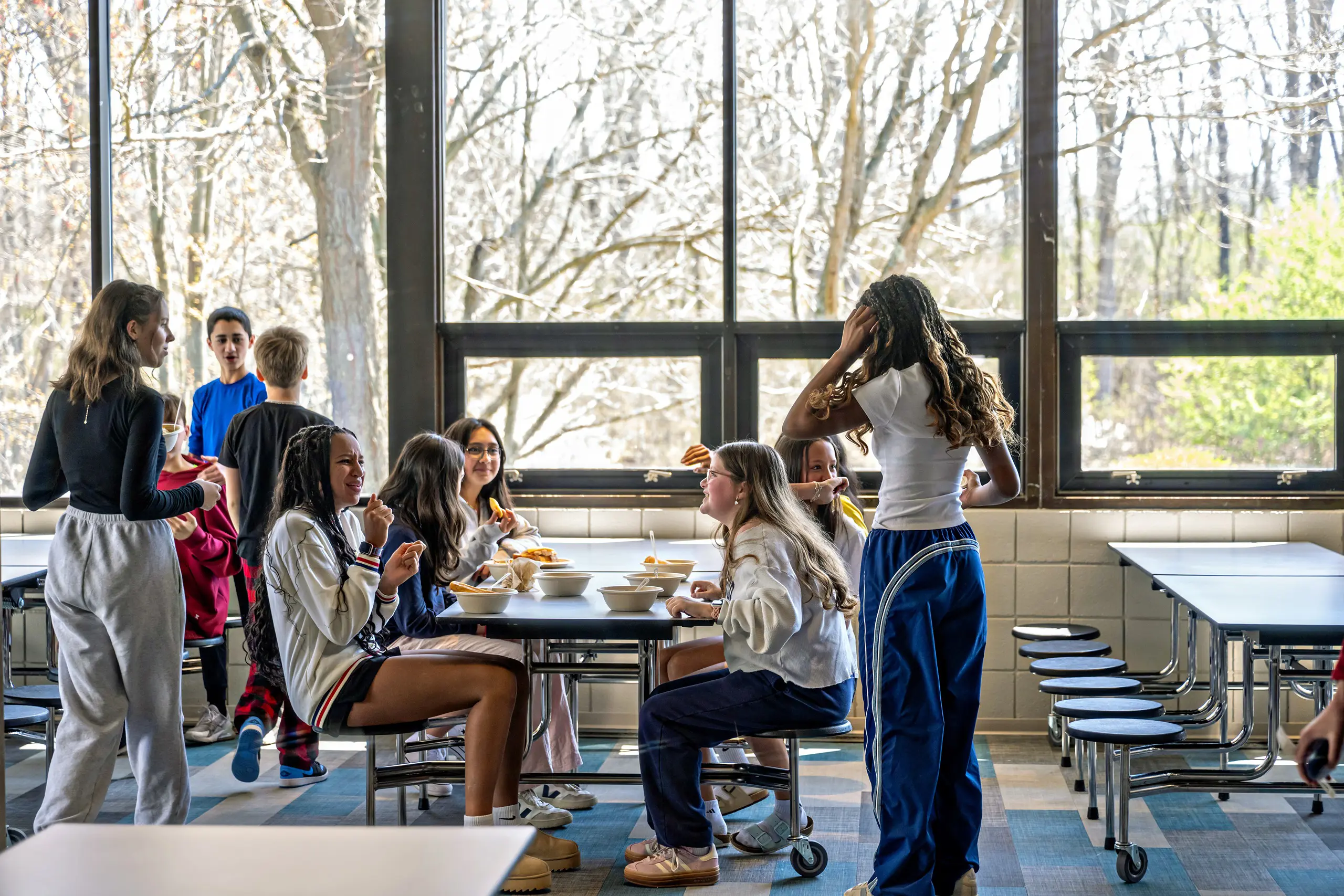 Students sitting at a lunch table together